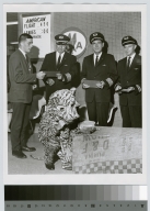 Student activities. Members of the Rochester Institute of Technology Spirit Committee awarding the American Airline pilots that flew Spirit, the Rochester Institute of Technology tiger mascot to Rochester, 1963