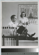 Academics, Chemistry, two Rochester Institute of Technology chemistry students in a staged pose. 1951