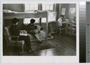 Student activities, three female students in a dorm room at Kate Gleason Hall