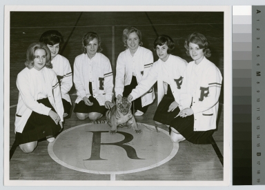 Student activities, group portrait of the Rochester Institute of Technology cheerleaders with Spirit the tiger mascot, 1963