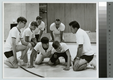 Student activities, Rochester Institute of Technology coach Earl Fuller demonstrating proper technique at the seventh annual wrestling and coaching school, [1960-1968]