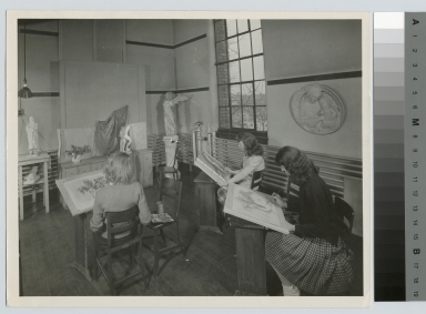 Academics, Art and Design. Three female students in a painting class.