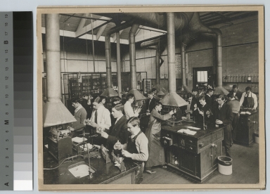 Academics, chemistry. Rochester Athenaeum and Mechanics Institute chemistry laboratory with students working on experiments, [1900-1920]