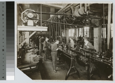 Students operate machinery, machine shop, School of Industrial Arts, Rochester Athenaeum and Mechanics Institute [circa 1907]