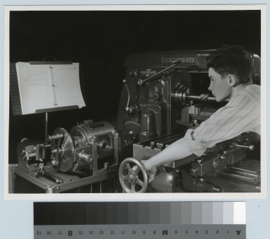 Unidentified student operating machinery, Mechanical Department, Rochester Institute of Technology