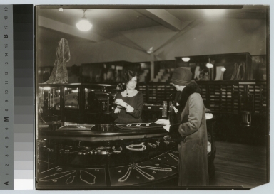 Cooperative student at jewelry counter, Retail Distribution course, Rochester Athenaeum and Mechanics Institute