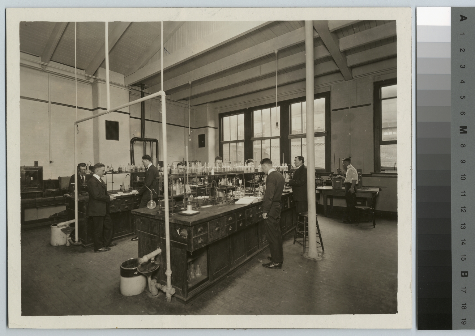 Academics, chemistry, Rochester Athenaeum and Mechanics Institute chemistry laboratory with male students working on experiments, [1920-1930]