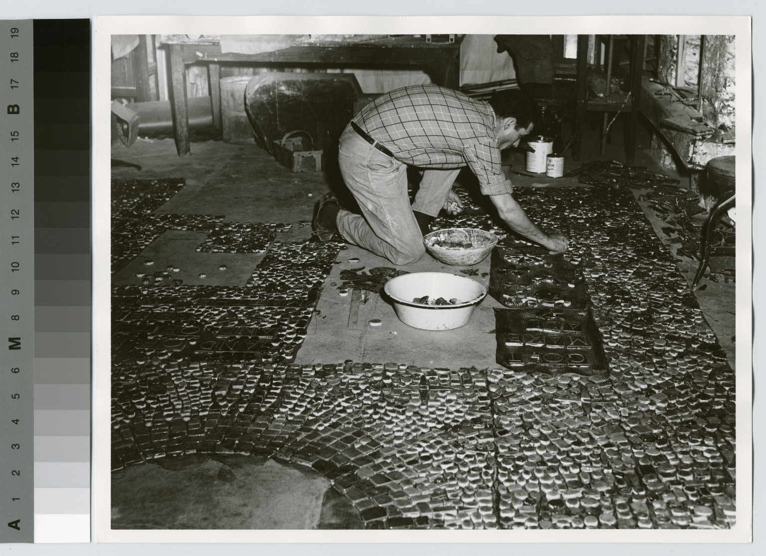 Student laying ceramic tile, School for American Craftsmen, Rochester Institute of Technology [1950-1960] [picture].